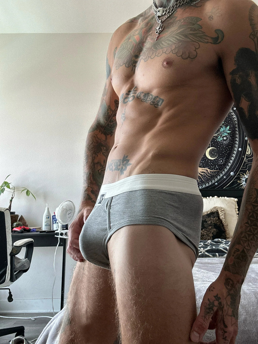 Model wearing the gray Ribbed Brief — YYCG men's ribbed bamboo-rayon underwear
