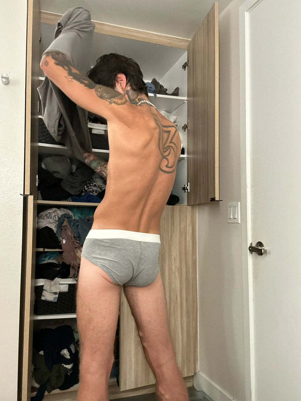 Model wearing the gray Ribbed Brief — YYCG men's ribbed bamboo-rayon underwear

