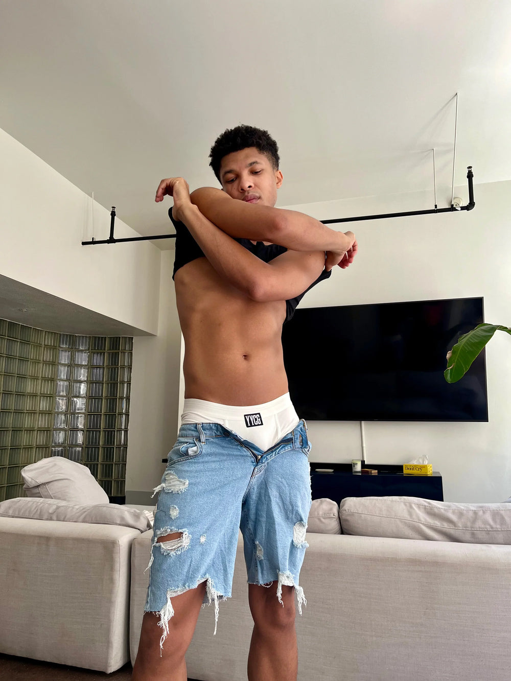 Model wearing the white Ribbed Boxer Brief — YYCG men's ribbed bamboo-rayon underwear
