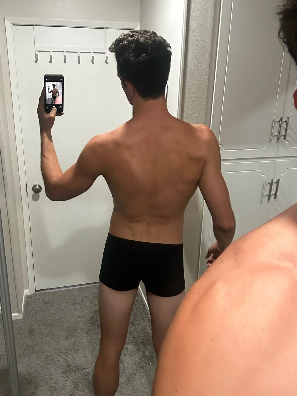 Model wearing the black Ribbed Boxer Brief — YYCG men's ribbed bamboo-rayon underwear
