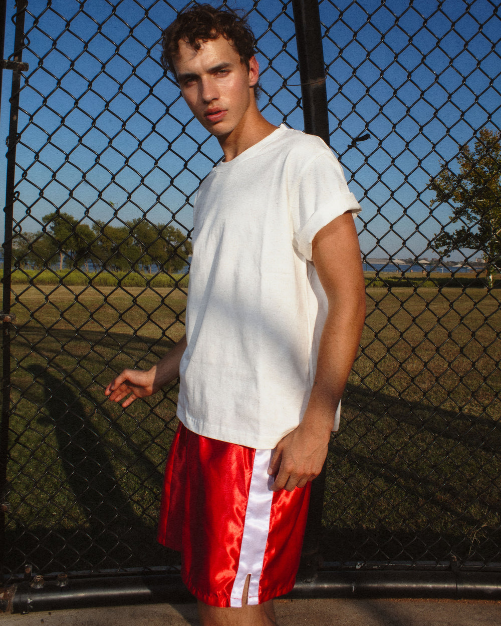 Model wearing the white T-Shirt — YYCG heavyweight 100% cotton tee
