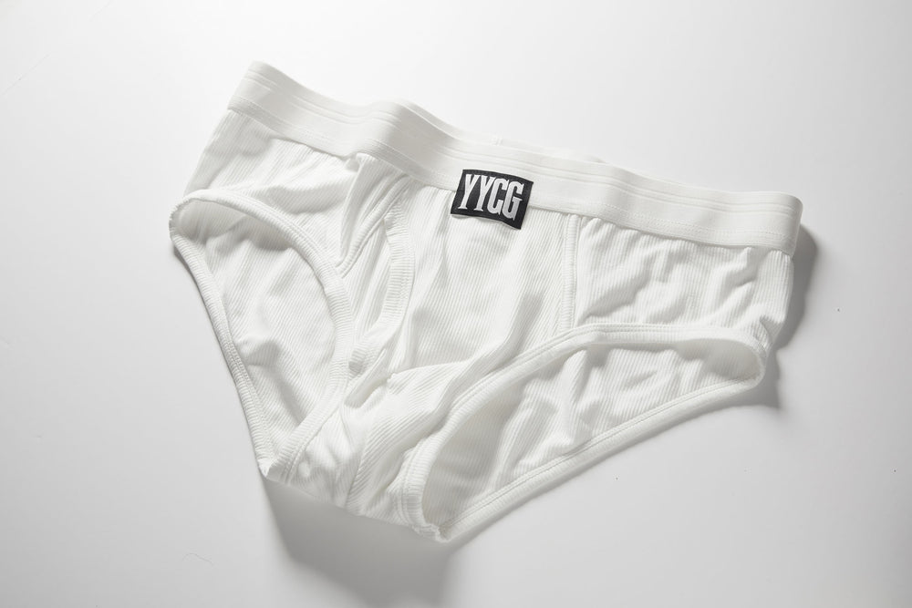 White Ribbed Brief studio flat-lay — YYCG men's ribbed bamboo-rayon underwear
