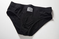 Black Ribbed Brief studio flat-lay — YYCG men's ribbed bamboo-rayon underwear
