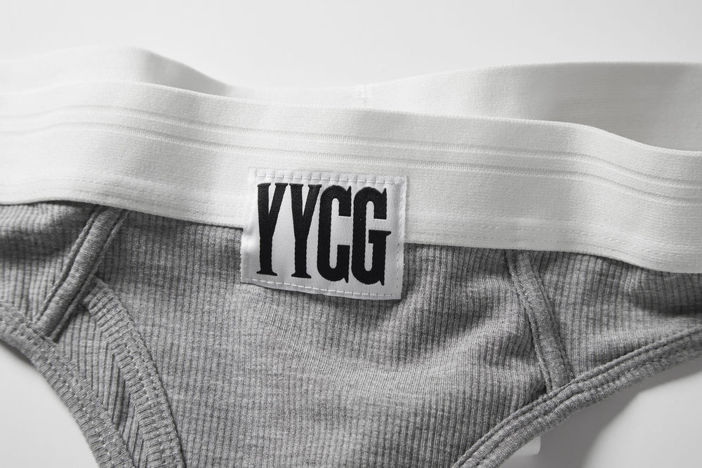 Gray Ribbed Thong studio flat-lay — YYCG women's ribbed bamboo-rayon underwear
