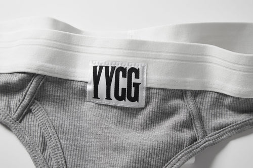 Gray Ribbed Thong studio flat-lay — YYCG women's ribbed bamboo-rayon underwear
