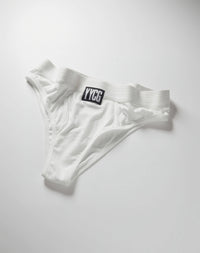 White Ribbed Boy Brief studio flat-lay — YYCG women's ribbed bamboo-rayon underwear

