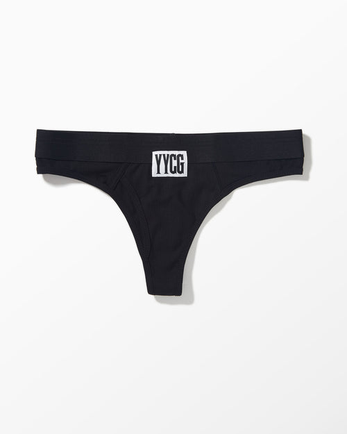 Black Ribbed Thong studio flat-lay — YYCG women's ribbed bamboo-rayon underwear
